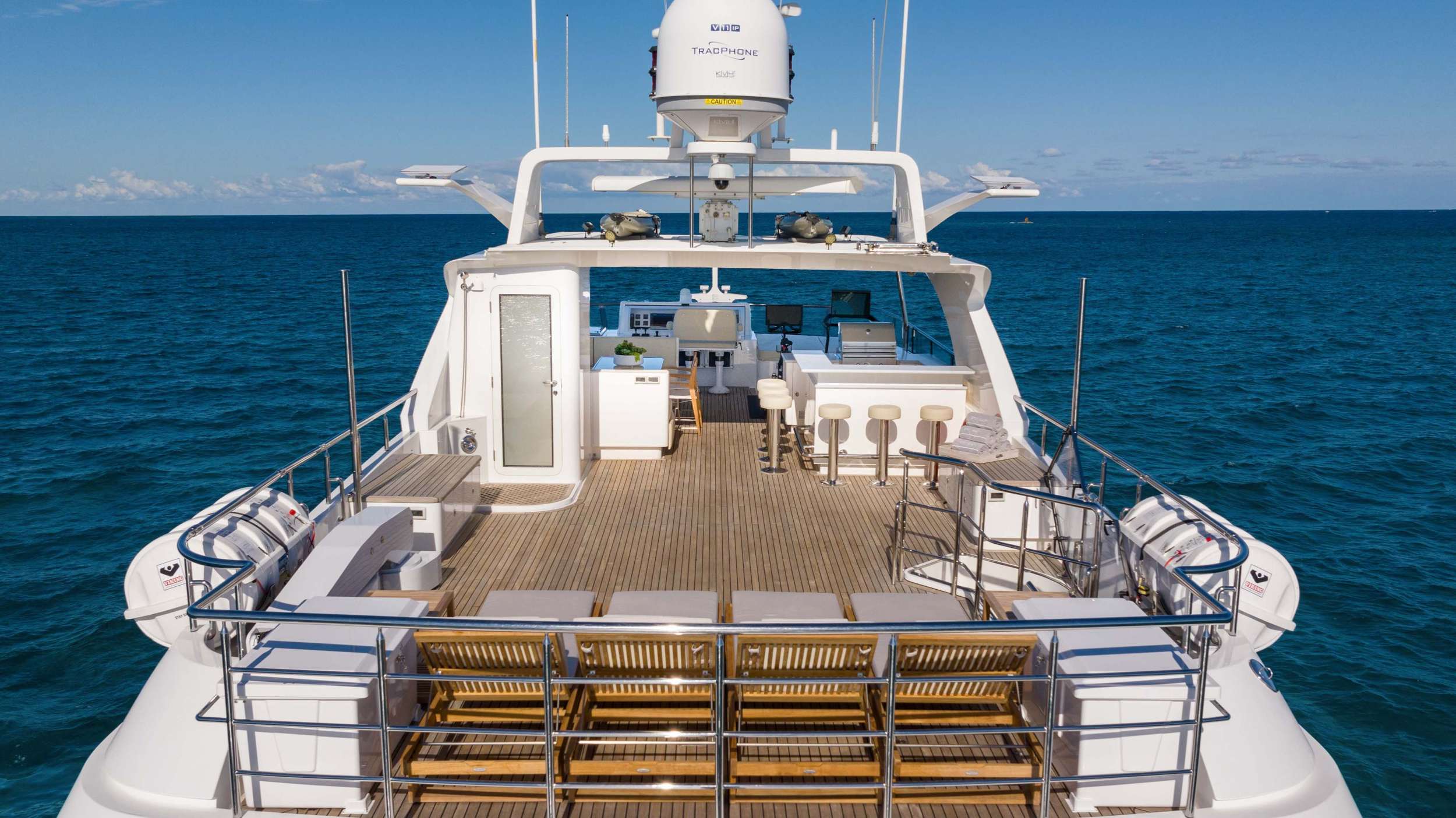 Sundeck with Lounge Chairs, Bar and Dining Area